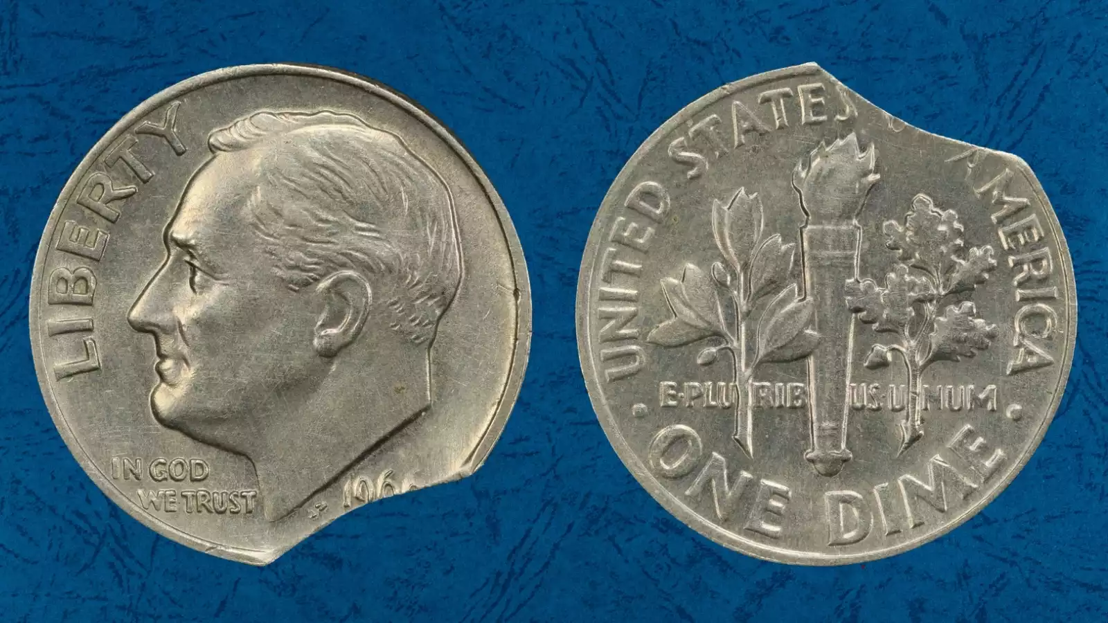 1966 Roosevelt dime clipped planchet error showing missing curved section from coin edge